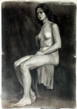 Desnudo de mujer sentada